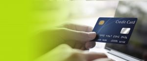 Person holding Credit Card